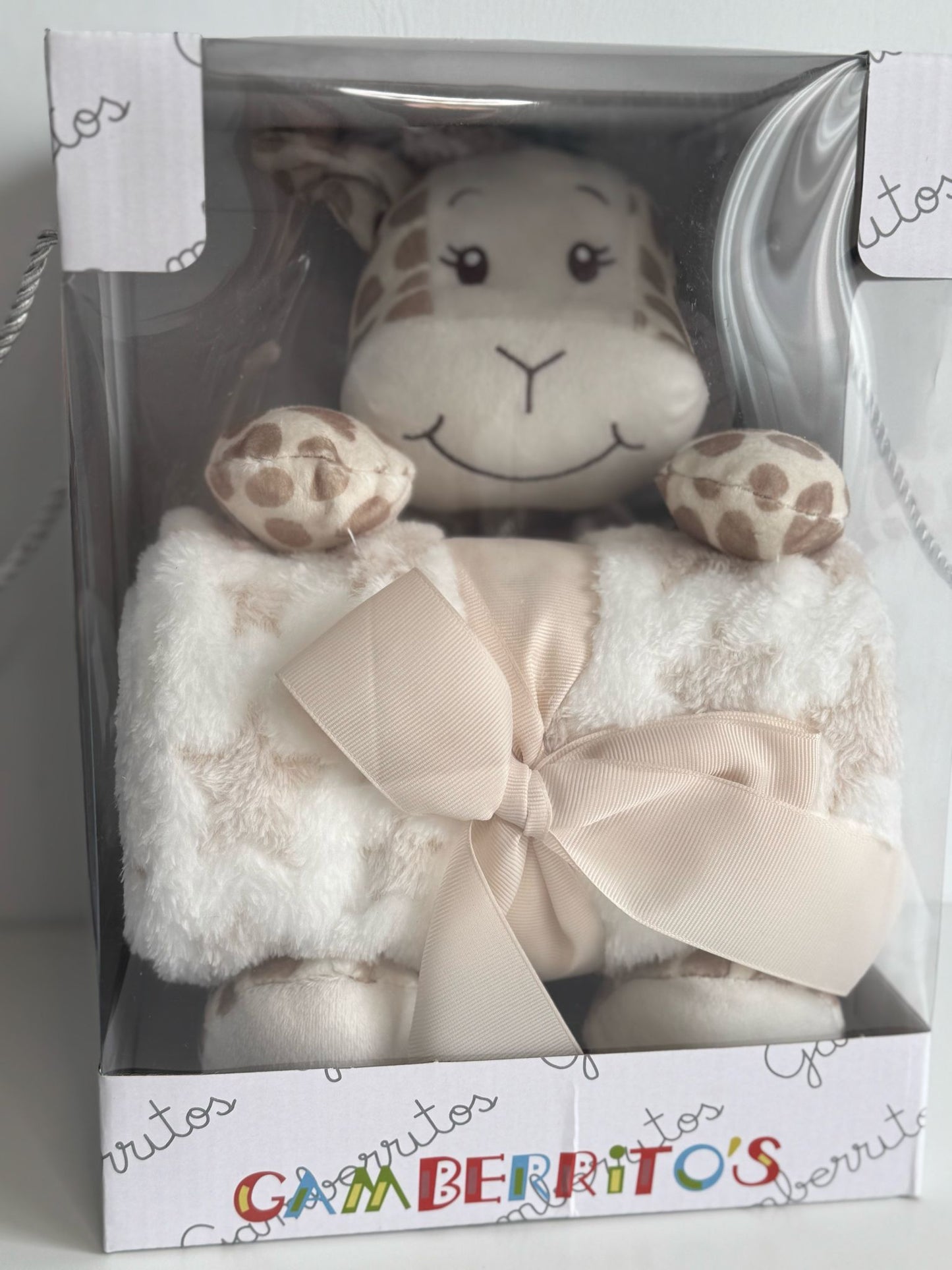 Manta y muñeco jirafa