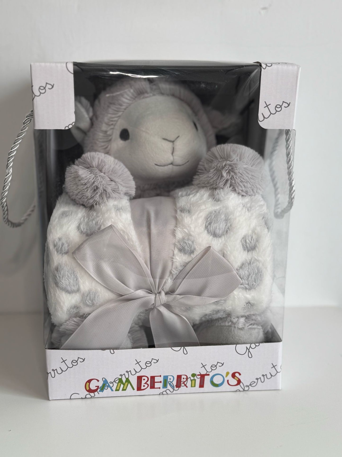 Manta y peluche oveja